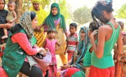 Hasina Rahman visiting a host community at Tanjimarkhola OTP centre, Bangladesh. Photo: Tariq Adnan / Concern Worldwide.