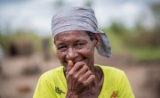 Joana Luis, 65, photographed with her family's pile of supplies received from Concern and Alliance2015 partners. Photo: Tommy Trenchard / Concern Worldwide.