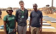 Residents rebuild their homes at the Kroo Bay slum.