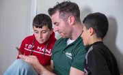 Michael Darragh Macauley meets Roman* and Mahma* at an Iraq refugee camp. 