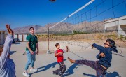 Michael Darragh Macauley meets with children living at an Iraq refugee camp.