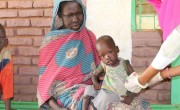 A child is measured for malnutrition in Muglad, West Kordofan.