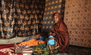 Aminata Abdoulaye (20) and her son Hassane (9 months). They live in the Lacouroussou District. Aminata is married to Agali, a motorcycle taxi driver. They have three children. Photo: Ollivier Girard / Concern Worldwide