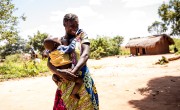 Image of Natalie Ngoyi at home with her 1 year old baby, Adere.