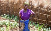 Farmer Eliza John Wesele standing in her home garden