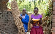 Selina Bizimaki and husband Day Bangiles showing a bowl of sesame