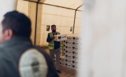 People receive hygiene kits at Khanke IDP site in Duhok. The kits contain shampoo, soap, detergent, nappies and pads for women. (Photo: George Henton/Concern Worldwide)