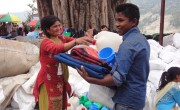 At a distribution of emergfency relief supplies in Bhirkot village, Dolakha district. (Photo: Reka Sztopa/Concern Worldwide)