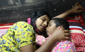 Sadia* (15) and her brother Mahir* sleep safely in a Concern supported Pavement Dweller Centre (PDC)