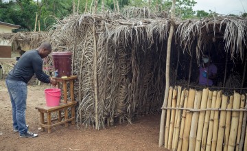 A screening area and hand washing station were part of the infection prevention control during the Ebola outbreak in Sierra Leone.
