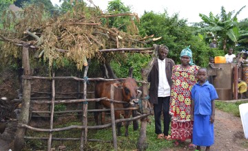Judith and Faustim Nsabimama with their daughter in Nyiakibungo cell/ Nkunamo village in Gishubi Sector, Gisagara District. They are beneficiaries of Concern’s Graduation programme. They purchased their cow through a combination of income generation activities and money received from their asset transfer. Credit: Síle Sammon/ Concern Worldwide.