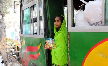 Sakuma* sells sweets and chocolates on crowded buses in Dhaka to save money for her brother's education. Sakuma* (14) and her brother Kassim* are supported by a Concern run pavement dweller center, Ananda Bazar, Dhaka. Having lived on the street most of her life, she lost her mother to illness and her father was a drug addict when a worker from the pavement dweller center found her. They both now live in the pavement dweller center and receive a host of supports from Concern including shelter, food, educati