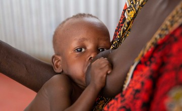 Child breastfeeding.