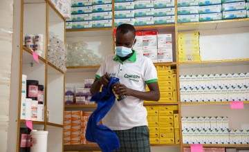 Medical worker checking medical supplies at the Weydow Health Centre, Mogadishu. Photo: Mustafa Saeed/Concern Worldwide