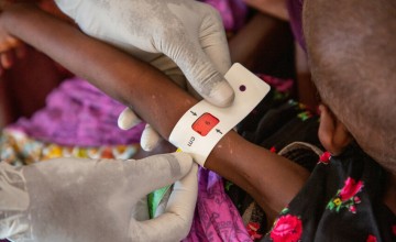 Leyla (aged 4) have her Mid-upper arm circumference, (MUAC), measured at the Siika Dheer Health Centre in Somalia, supported by Concern