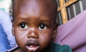 African baby boy looking up 
