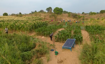 Aerial view of solar water pump in field 