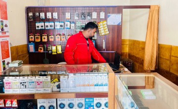 Chadi* working in his shop in Syria