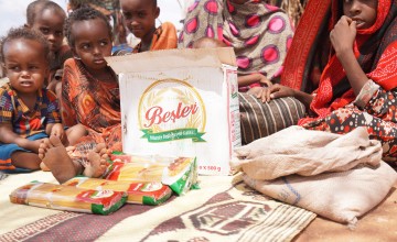 Bishaaro's children with food items purchased as a result of the Concern ERNE monthly cash transfer.