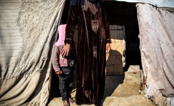 Amira* with her daughter outside of the tent where they live in Syria Photo: Gavin Douglas/Concern Worldwide *Name has been changed