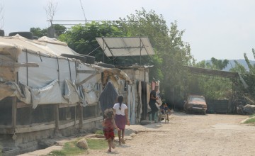 Assia walks outside the family shelter in Lebanon. Photo: Omar Daouk/Concern Worldwide