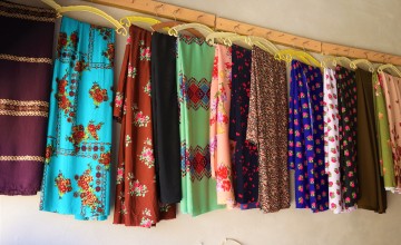 Fabric hangs in Sabah's sewing business, funded by a grant from Concern and Irish Aid. Photo: Concern Worldwide