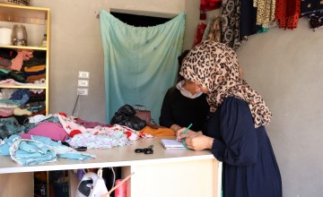 Sabah works in her sewing business, funded with a grant from Concern and Irish Aid. Photo: Concern Worldwide.