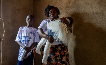 Mother-of-nine Claire Masika Muisa (48) with her son Jonathan and daughter Ebenezer (2) Photo: Eugene Ikua/Concern Worldwide