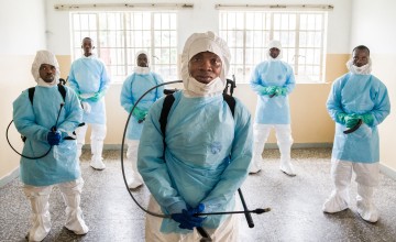 Burial teams pictured in protective gear at a hospital in Freetown, Sierra Leone.