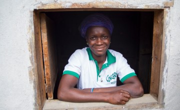 Varbah Jenneh at her shop in the village of Dadazu, Lofa County, Liberia. Varbeh started the shop with loan from the local CSLA. Photograph taken by: Kieran McConvillle/Concern Worldwide