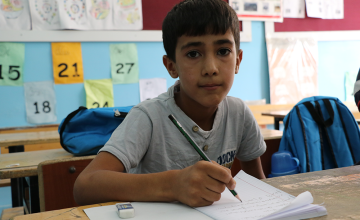 A young boy pictured at school.