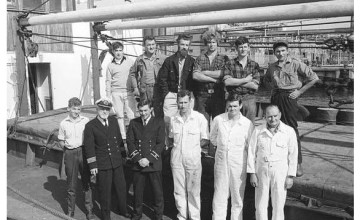 The Crew of the Columcille Top L-R Kevin Edwards (Cook), Nickey Beggs (Bosun), Ollie Harwick (2nd Mate), John McGrath (AB), Brian Byrne (AB), Tony O’Moore (AB) Bottom L-R Karl Vekins ( Catering Boy), Padraig O’Shea (Captain), Niall Foley (1st Mate), Fr. Joe Fitzgibbons (3rd engineer), Peter Shortall (2nd engineer), Kevin O’Reilly (Chief engineer). Photo: Concern Worldwide