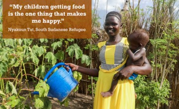 Nyakoun Tut waters her own fruit and vegetables which she has grown from seeds provided by Concern to help her live in a more sustainable way. Photo: Jennifer Nolan/Concern Worldwide.