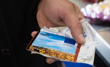 A Concern e-Voucher along with receipts for purchased food. Photo: Kevin Carroll/Concern Worldwide.
