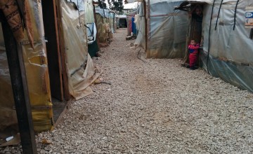 Inside an informal tented settlement supported by Concern in Lebanon. Photo: Kevin Jenkinson/Concern Worldwide.