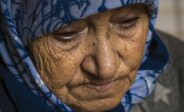 "Iman" lost 19 members of her family, including her husband, all of her children except one daughter, and all of her grandchildren except one grandson in a bombing attack on their home in Syria. Photo: Kieran McConville / Concern Worldwide.