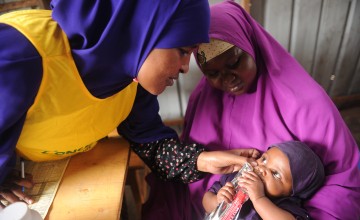 Hani, Nala and a Concern worker at a Concern support health centre in Somalia. Photo: Mohamed Abdiwahab/Concern Worldwide. 