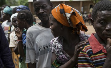 A woman queues for humanitarian assistance in Nsanje, Malawi. Photo: Alexia Webster/PANOS