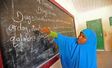 Aamun (name changed to protect identity) attending class at '21st November School' which is supported by Concern Worldwide. Somalia, 2015. Photo: Mohamed Abdiwahab.