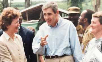 Dominic MacSorley and Jerry Merx talking with Mary Robinson during her visit to Concern's programmes. As President of Ireland, she was one of the first head's of state to visit Rwanda in the wake of the genocide. Photo: Concern Worldwide.