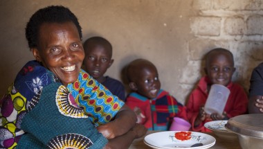 Violette Bukeyeneza sitting with her family in Cibitoke, Burundi. Photo: Abbie Trayler-Smith / Concern Worldwide.