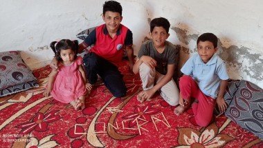 Samer* (14) with his sister Amira* and brothers Nahed* and Zeyn*. *Names changed to protect the identity of individuals. Photo: Concern Worldwide. 