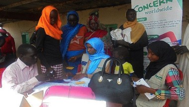 Boll with Concern emergency response team in Meyriam County distributing kits to meet basic needs. Photo: Concern Worldwide.