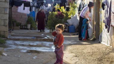 A Syrian child living in an informal settlement near the city of Halba in Northern Lebanon. Photo taken by Kieran McConville / Concern Worldwide.