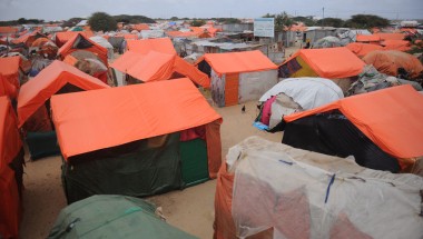 Makeshift houses in an IDP camp in Somalia. They are made up of old clothes and sacks reinforced by sticks with plastic sheets on top to avoid rains. Photo: Mohamed Abdiwahab / Concern Worldwide