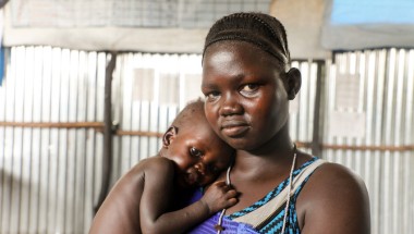 South Sudanese refugee Nyakoun Tut with her son Thujin after he was treated for malnourishment by Concern Worldwide at a refugee camp in Gambella, Ethiopia