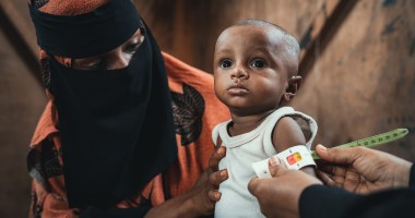 Baby Sabi* and his mother Amina*