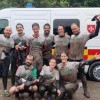 Team Concern celebrates after completing Hell and Back