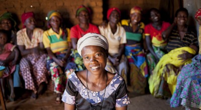 Jeanne D’Arc Niyingabiye, a beneficiary of Concern's Graduation Program, with her SILK group in Burundi.