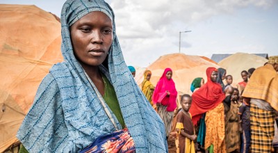 Bishara (24) and baby Abshir and Nasir (2) in Hanano zone of the IDP settlement on the outskirts of Baidoa, Somalia
